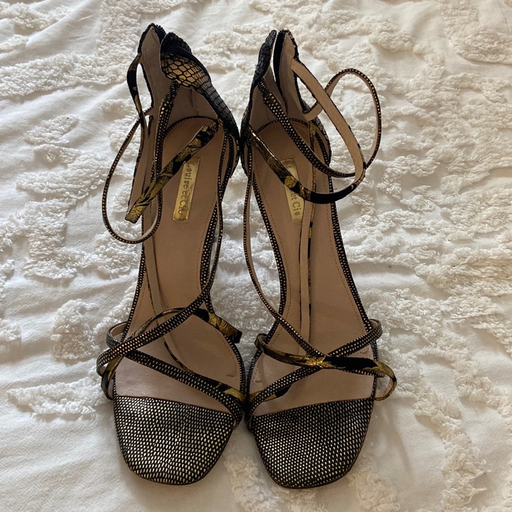 Black and gold strappy heels